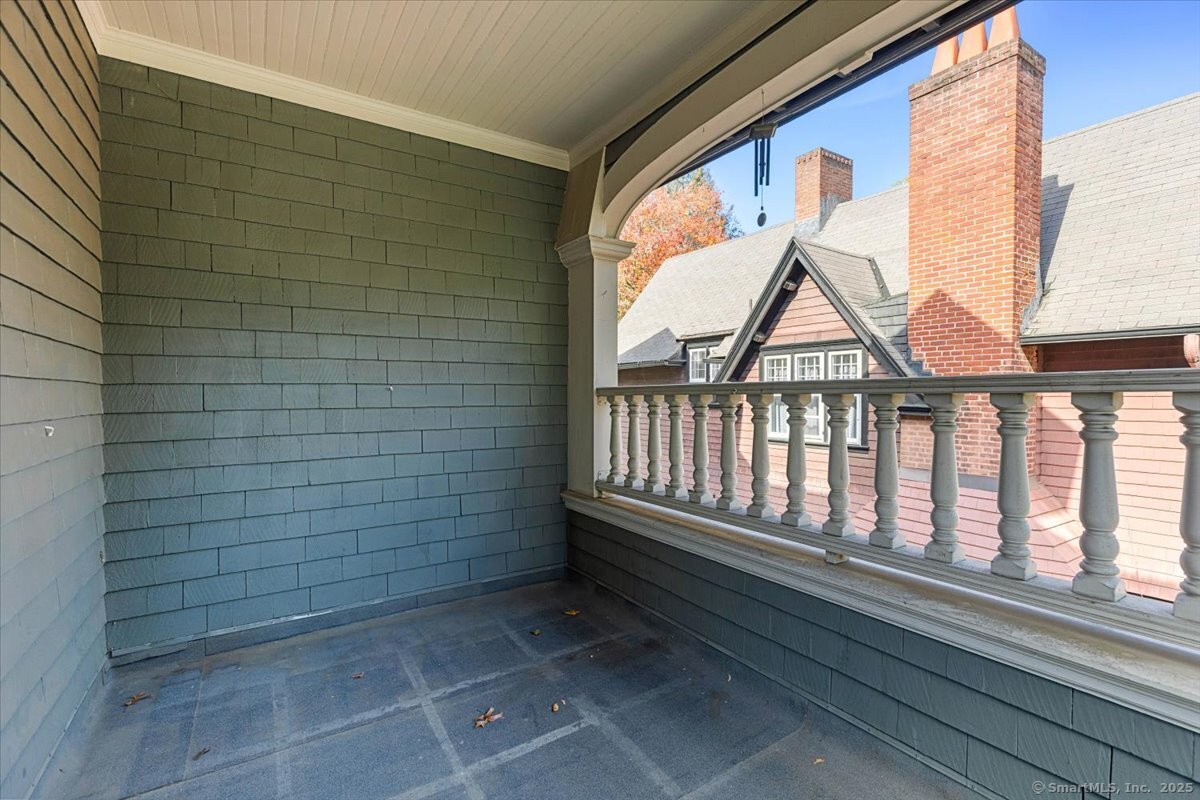 590 Whitney Avenue, Unit 2 New Haven, CT 06511 - Photo 14 of 18 a view of a porch with a bench