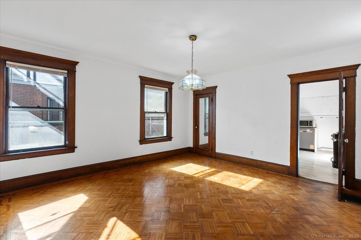 590 Whitney Avenue, Unit 2 New Haven, CT 06511 - Photo 8 of 18 a view of an empty room with window