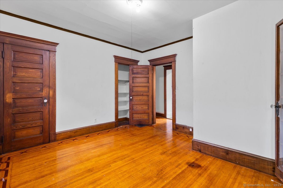 590 Whitney Avenue, Unit 2 New Haven, CT 06511 - Photo 10 of 18 an empty room with closet