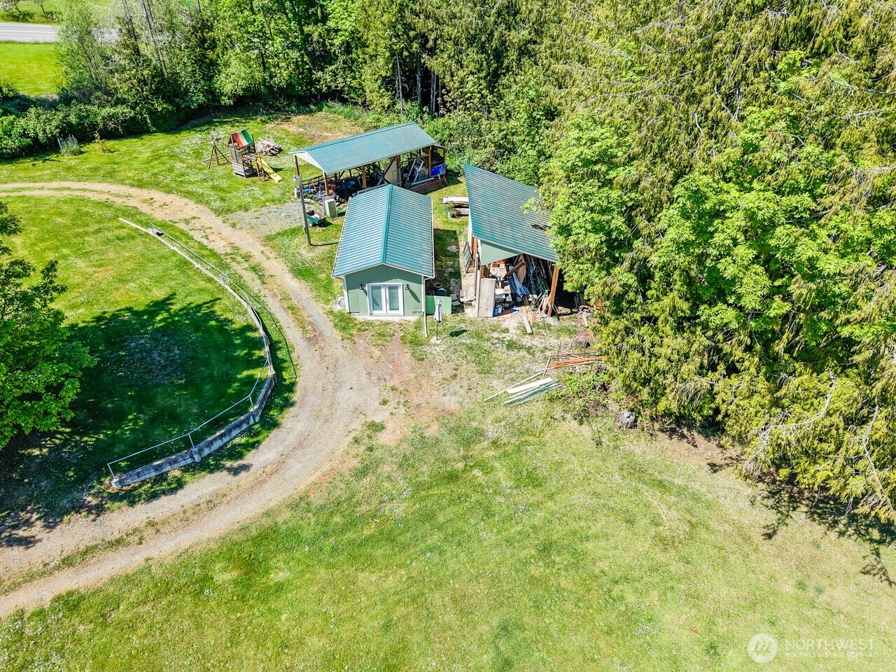 63 East Arnette Road Port Angeles, WA 98362 - Photo 7 of 40 a view of a house with a yard