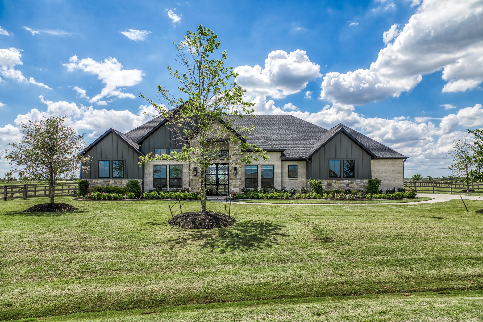 4009 Ranch Home Drive Waller, TX 77484 - Photo 2 of 49 a front view of a house with a yard