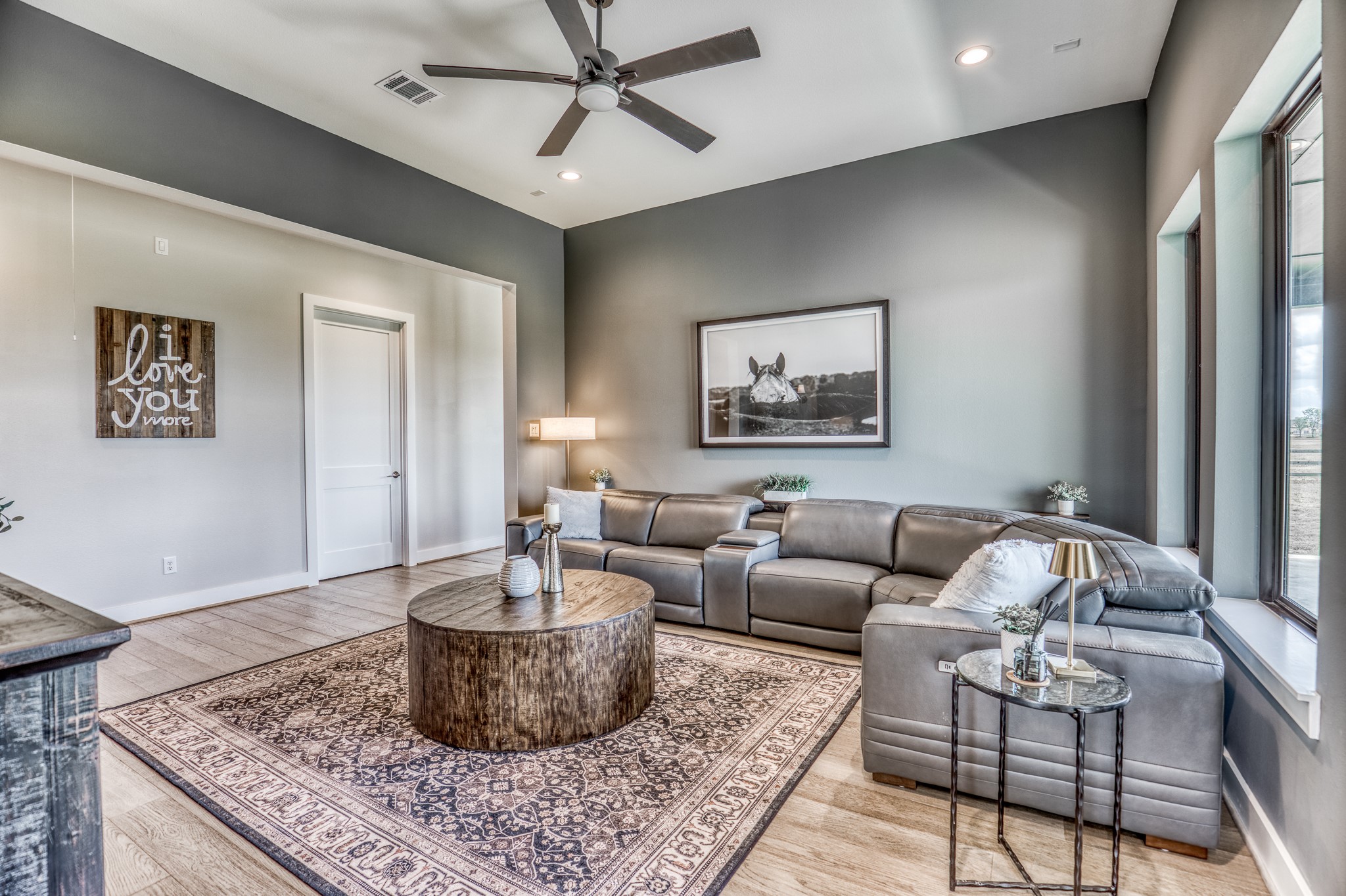 4009 Ranch Home Drive Waller, TX 77484 - Photo 22 of 49 a living room with furniture and a rug