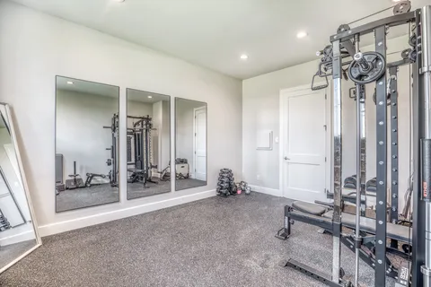 a view of a room with gym equipment