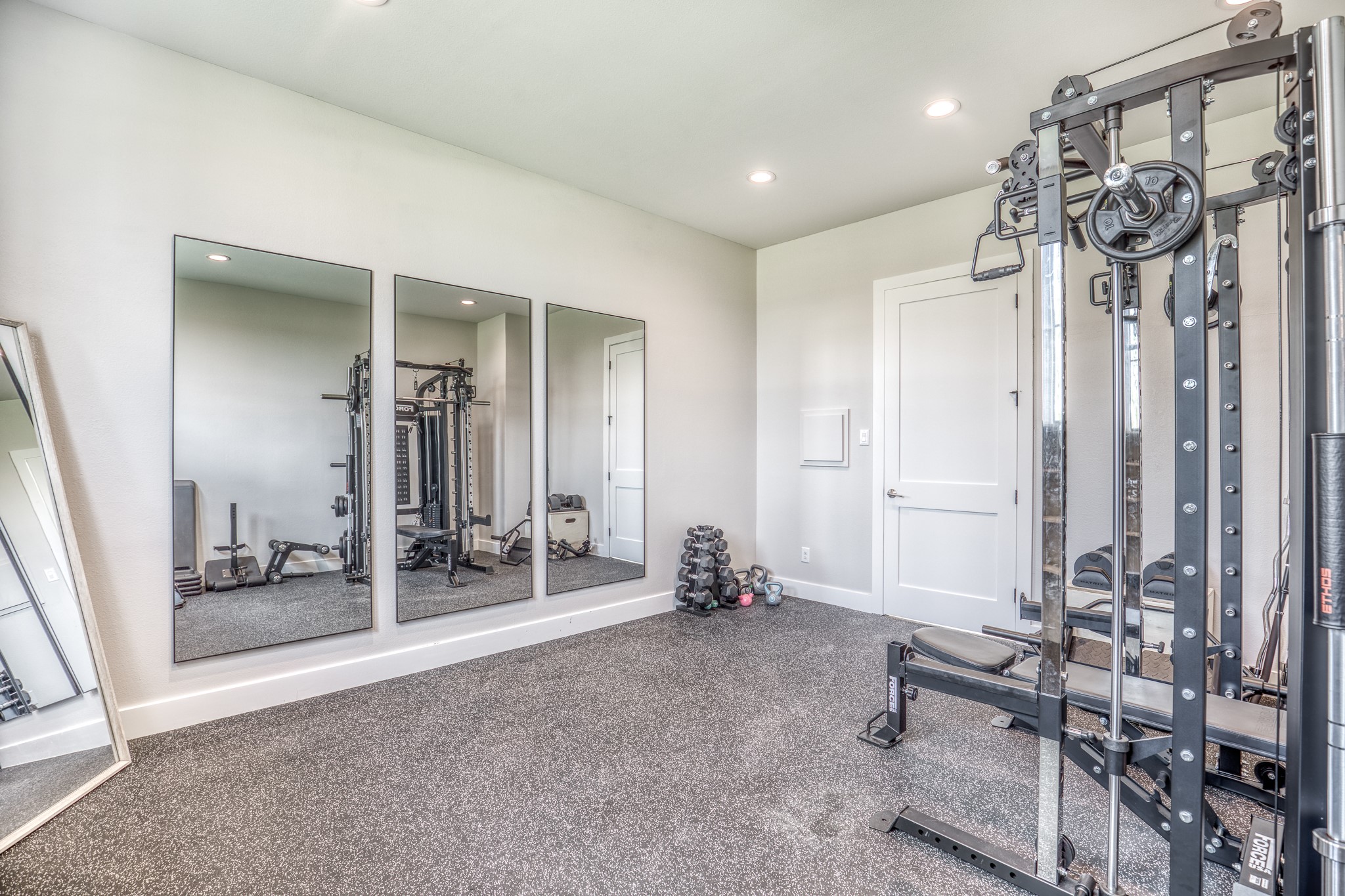 4009 Ranch Home Drive Waller, TX 77484 - Photo 28 of 49 a view of a room with gym equipment