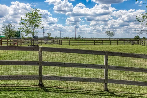 a view of a stadium that has a big playing ground