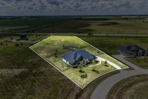 a view of a swimming pool and an outdoor space