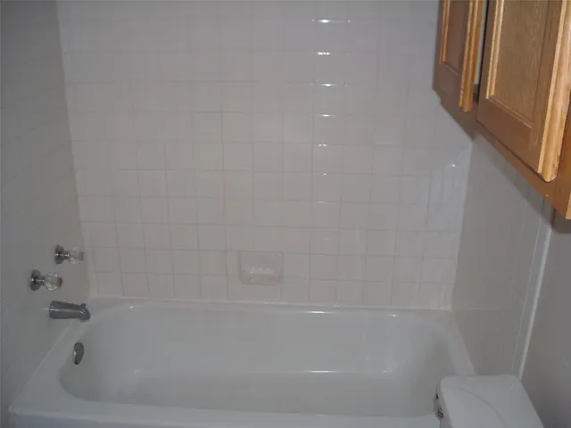 a bathroom with a bathtub