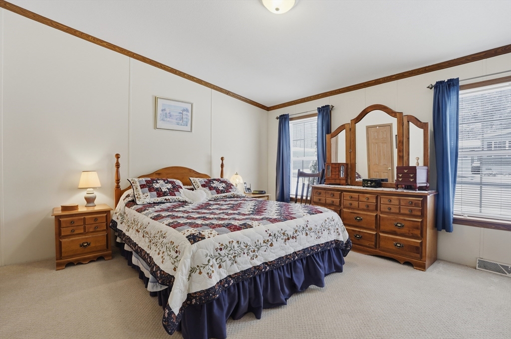 5 Cabot Road Winchendon, MA 01475 - Photo 17 of 31 a bedroom with a bed and a dresser