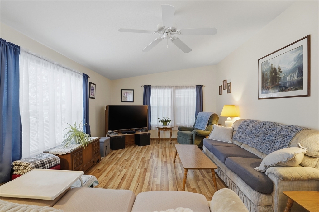 5 Cabot Road Winchendon, MA 01475 - Photo 4 of 31 a living room with furniture and a flat screen tv