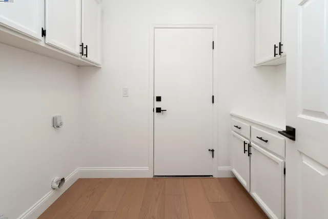 a view of a two chairs and table in the balcony