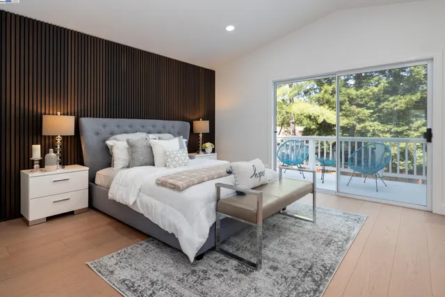 a work room with furniture and a window