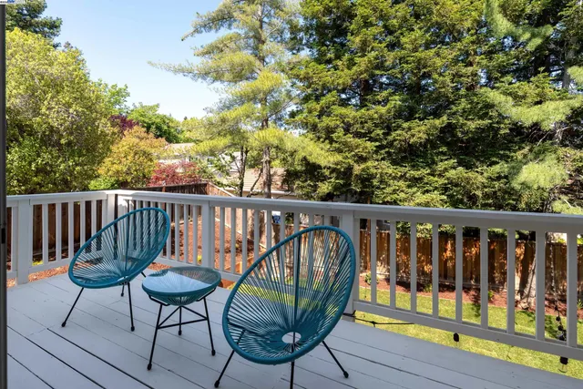 a spacious bathroom with a double vanity sink a mirror and a shower
