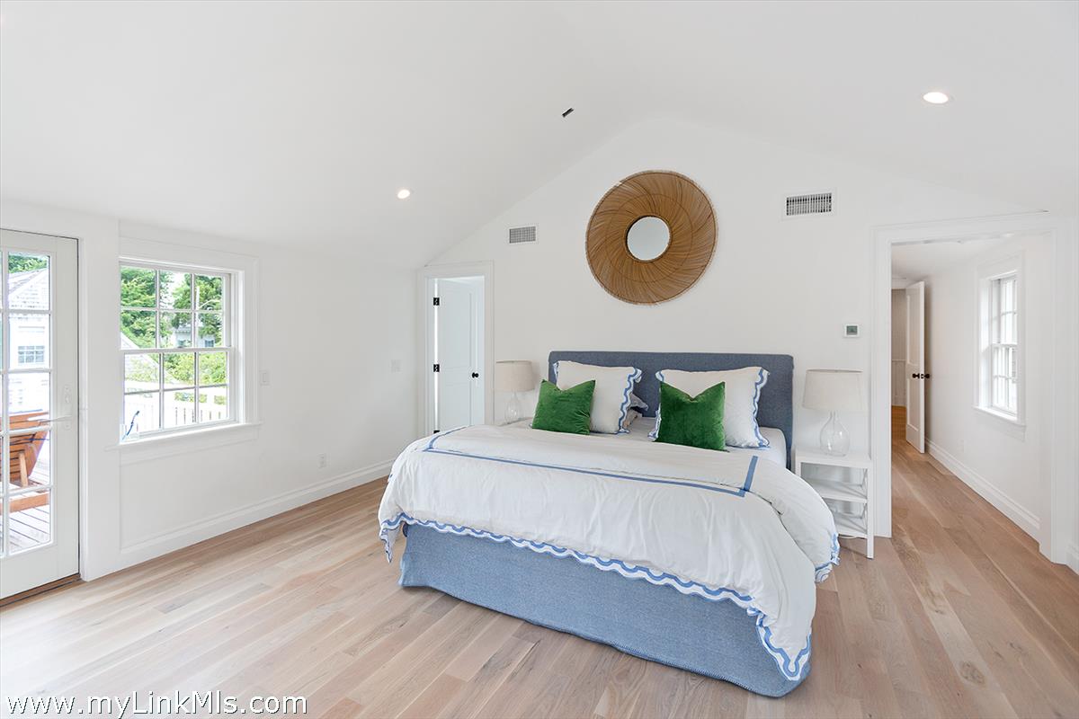 4 Cottle Lane Edgartown, MA 02539 - Photo 25 of 44 a bedroom with a bed and window