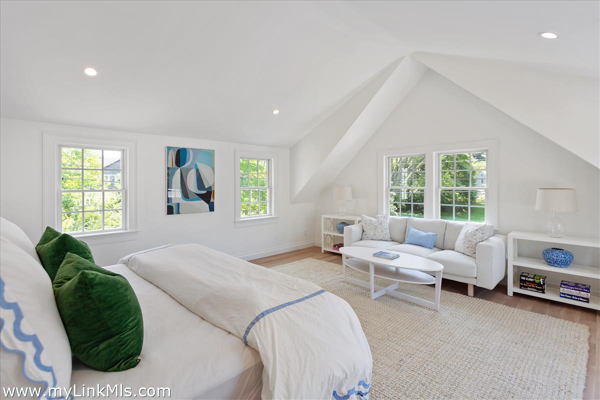 4 Cottle Lane Edgartown, MA 02539 - Photo 27 of 44 a bedroom with a bed and a window