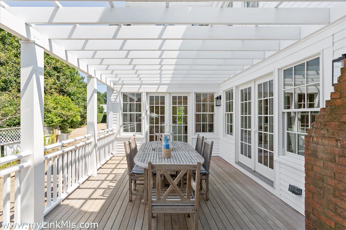 4 Cottle Lane Edgartown, MA 02539 - Photo 36 of 44 a view of a dining room with furniture window and outside view