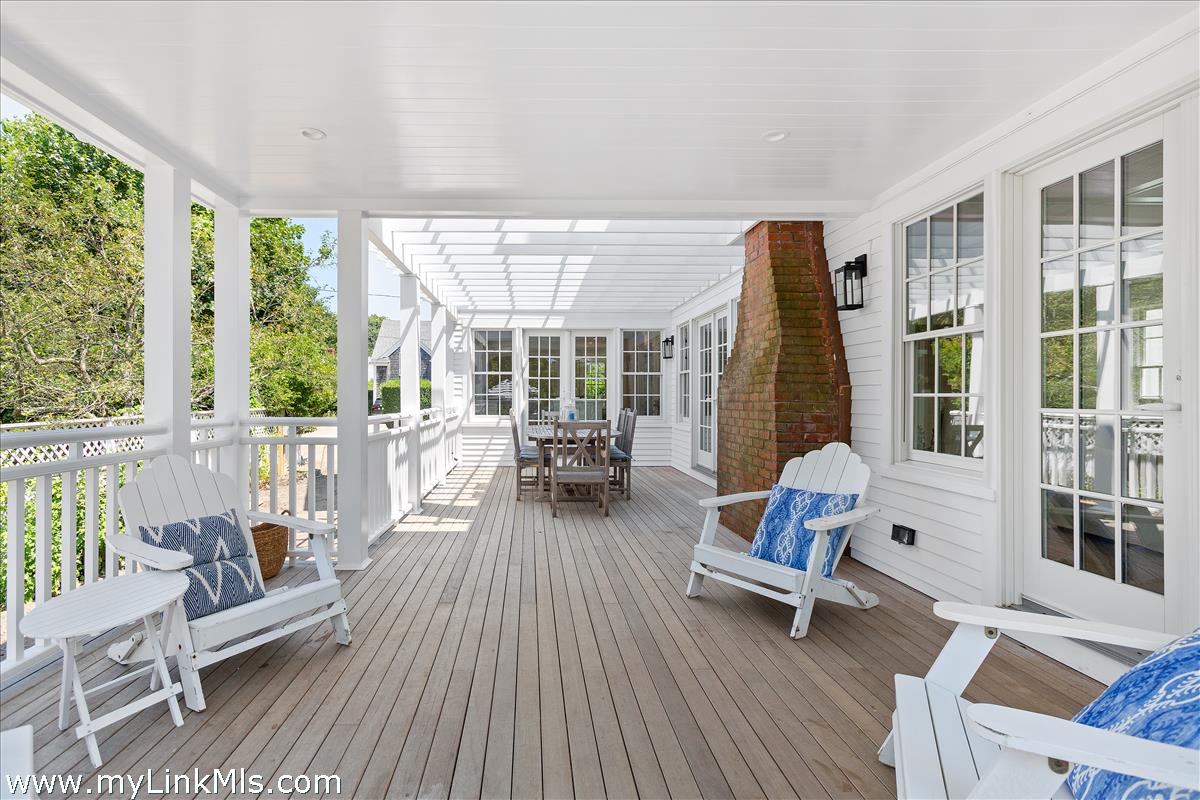 4 Cottle Lane Edgartown, MA 02539 - Photo 37 of 44 a living room with furniture and a wooden floor