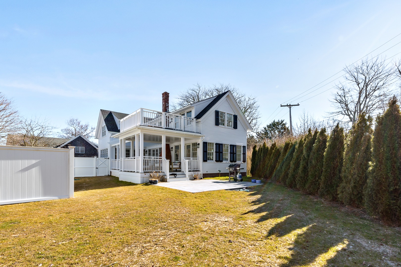 4 Cottle Lane Edgartown, MA 02539 - Photo 38 of 44 a front view of a house with swimming pool