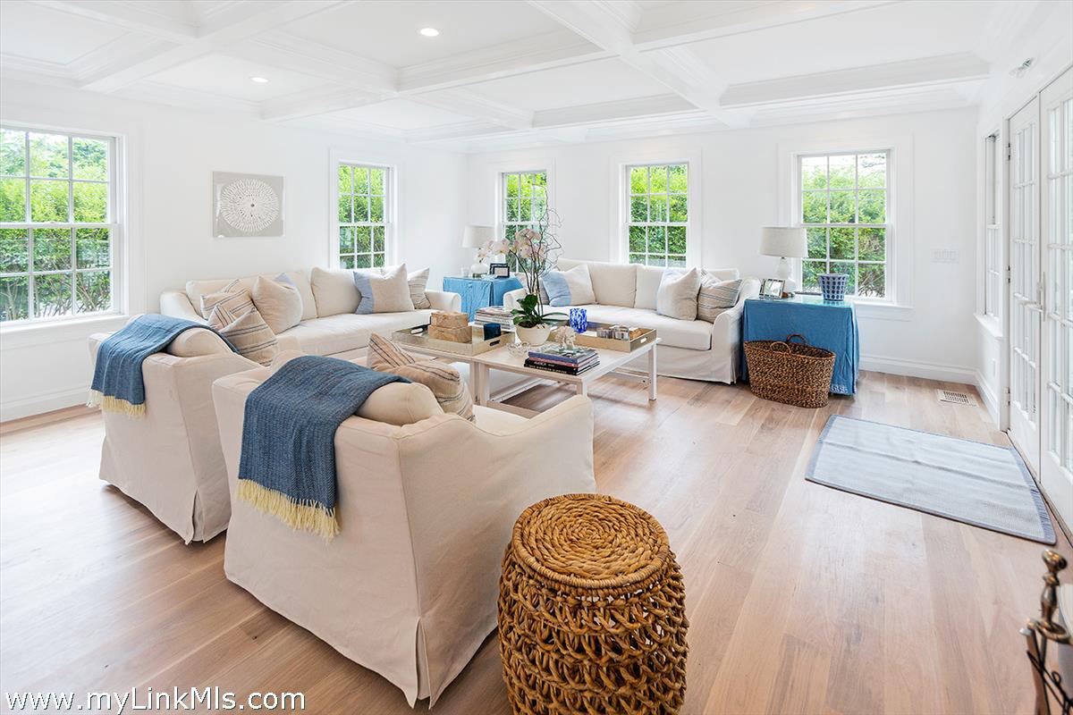 4 Cottle Lane Edgartown, MA 02539 - Photo 10 of 44 a living room with furniture and a large window