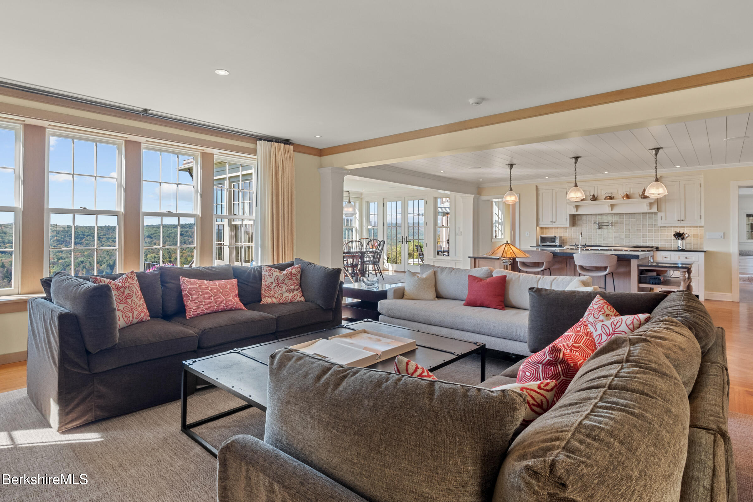 30 E Road Alford, MA 01266 - Photo 27 of 82 a living room with furniture kitchen view and large windows