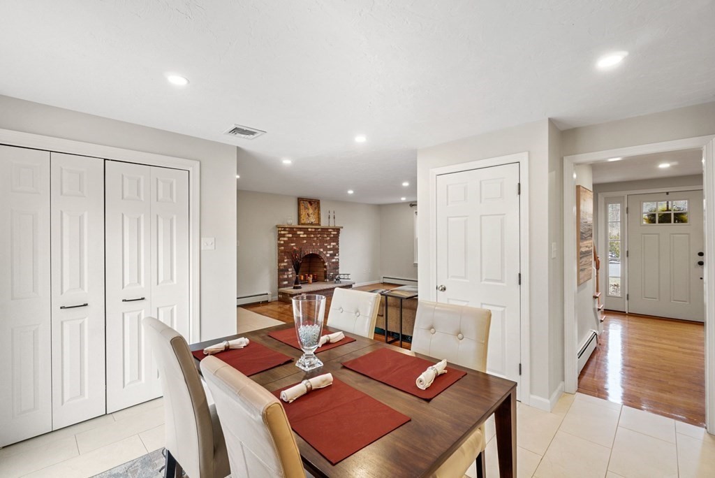 60 Hitching Post Drive Walpole, MA 02081 - Photo 12 of 37 a view of a dining room with furniture and wooden floor