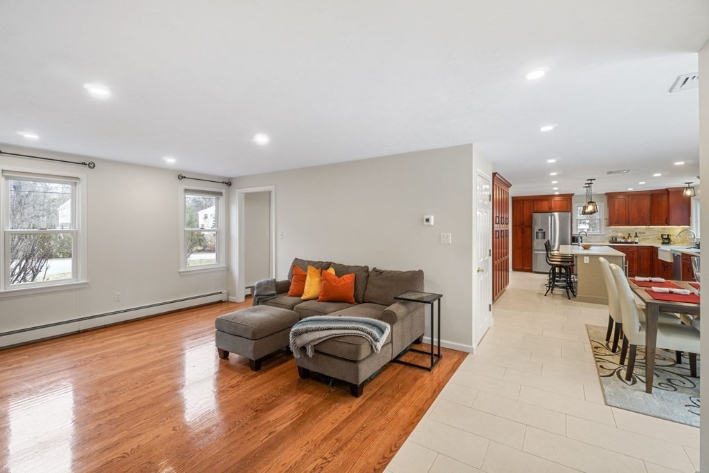 60 Hitching Post Drive Walpole, MA 02081 - Photo 13 of 37 a living room with furniture and a wooden floor