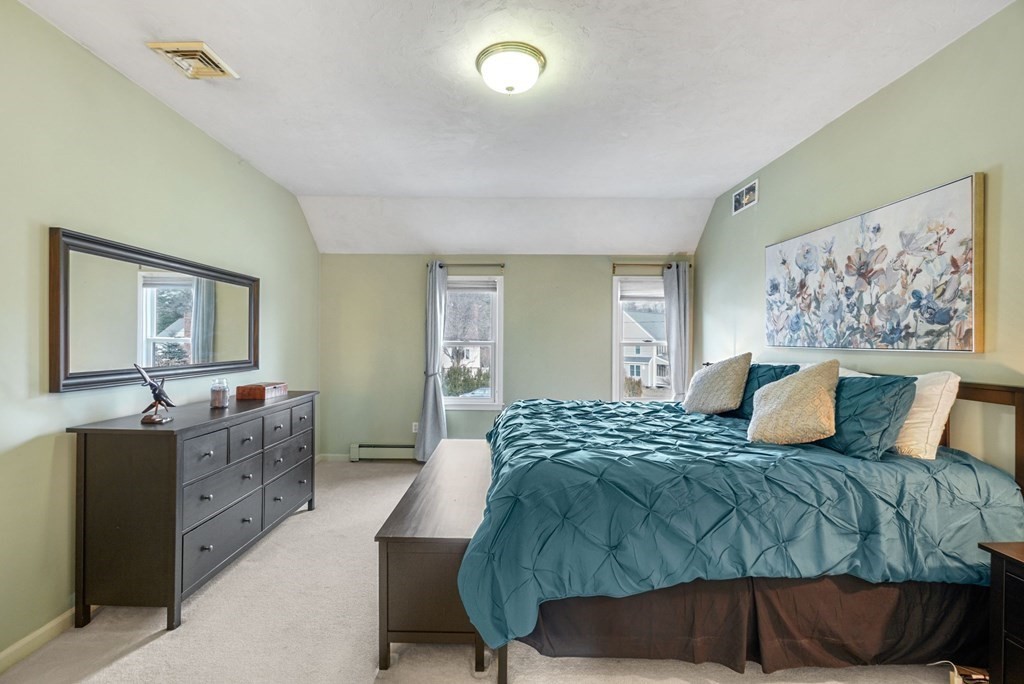 60 Hitching Post Drive Walpole, MA 02081 - Photo 20 of 37 a bedroom with a bed and window