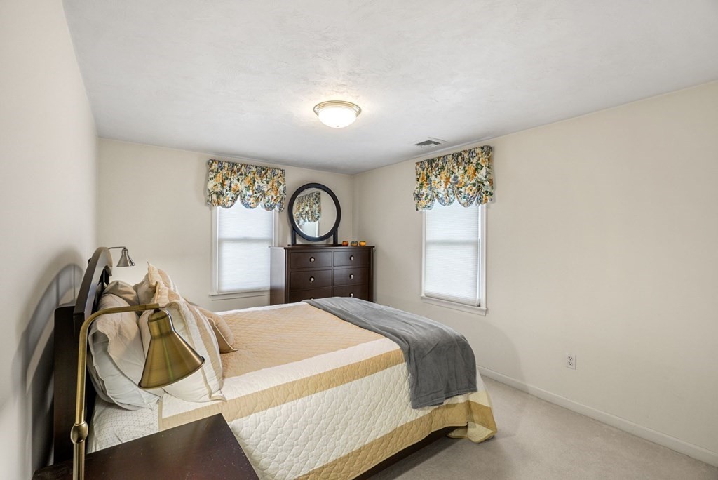 60 Hitching Post Drive Walpole, MA 02081 - Photo 29 of 37 a bedroom with a bed and window