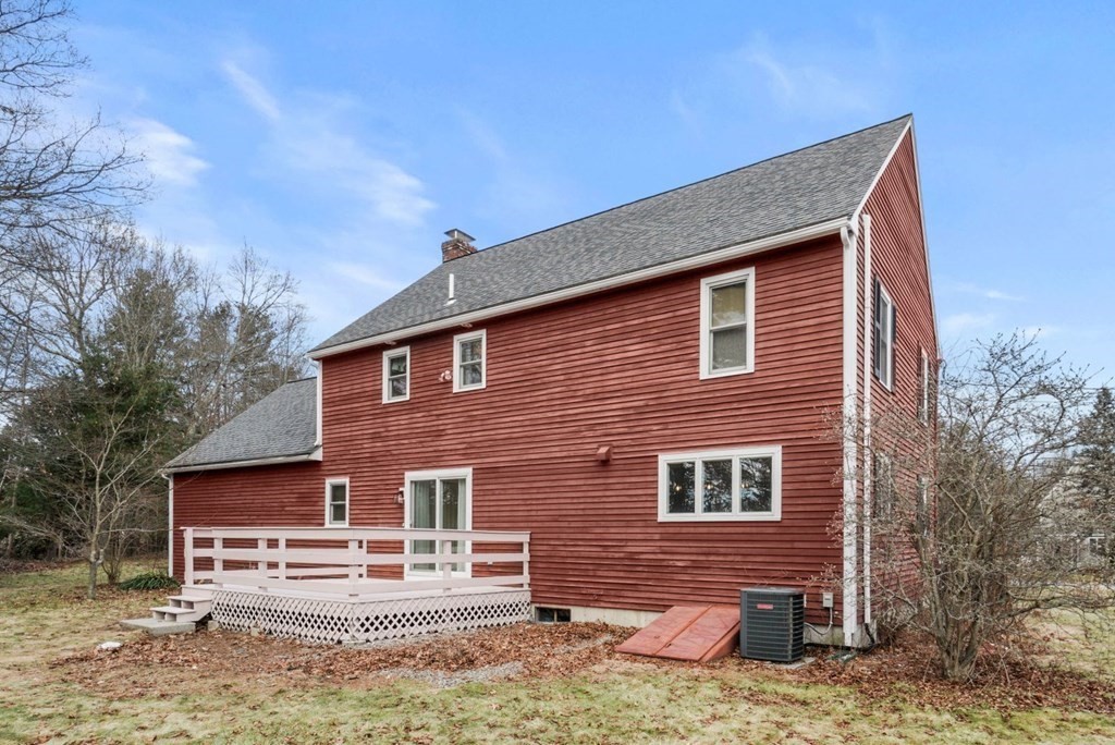 60 Hitching Post Drive Walpole, MA 02081 - Photo 33 of 37 a brick house with tree in front of it