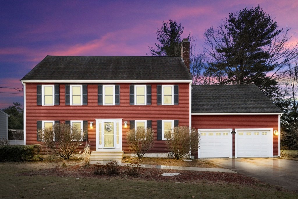 60 Hitching Post Drive Walpole, MA 02081 - Photo 37 of 37 a front view of a house with a yard