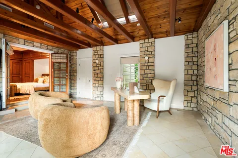 a view of a living room and dining room