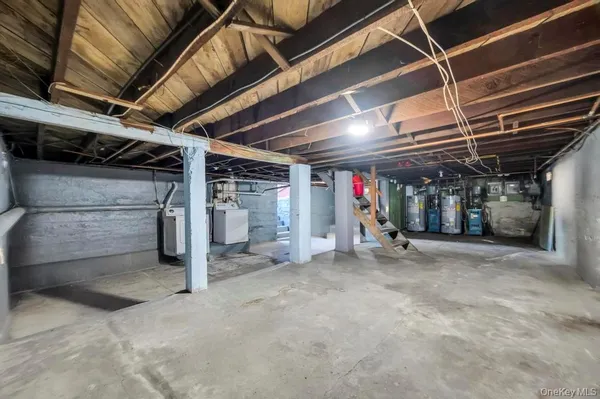 a view of under construction room and wooden roof