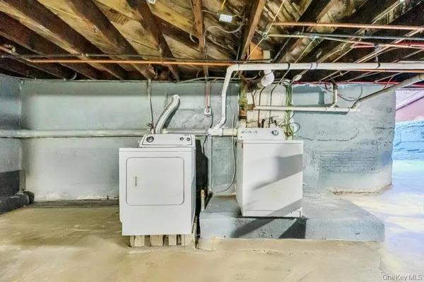 a utility room with a washer and dryer