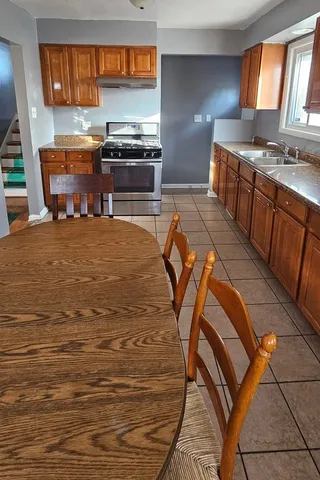 a view of a dining area with furniture and window