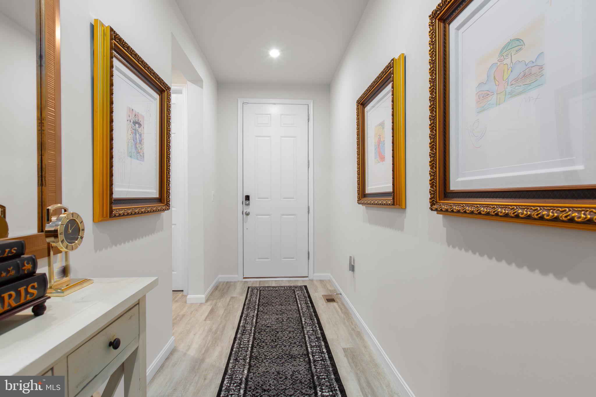 6306 Bobcat Lane King George, VA 22485 - Photo 14 of 58 a bathroom with a granite countertop sink and a mirror