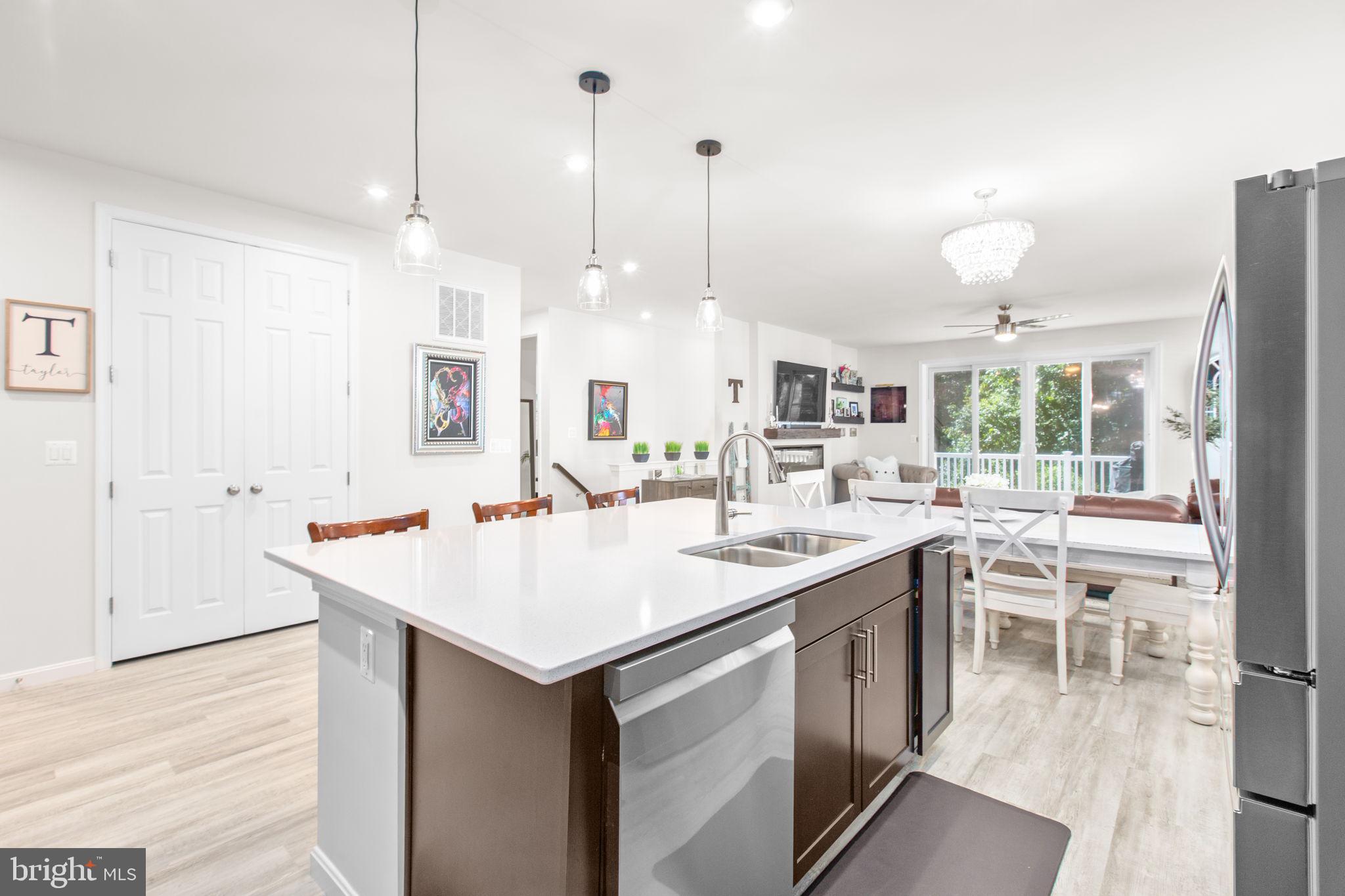 6306 Bobcat Lane King George, VA 22485 - Photo 6 of 58 a kitchen with a sink and stove