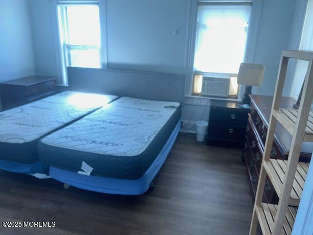 1047 Stratton Place Long Branch, NJ 07740 - Photo 11 of 22 a bed sitting in a bedroom next to a window