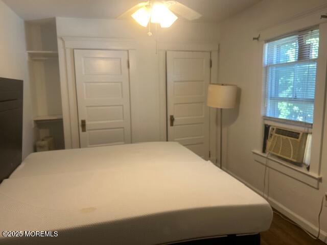 1047 Stratton Place Long Branch, NJ 07740 - Photo 13 of 22 a bedroom with a bed and cabinet