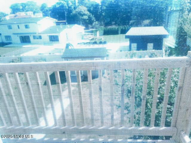 1047 Stratton Place Long Branch, NJ 07740 - Photo 2 of 22 a view of a porch with a floor to ceiling window