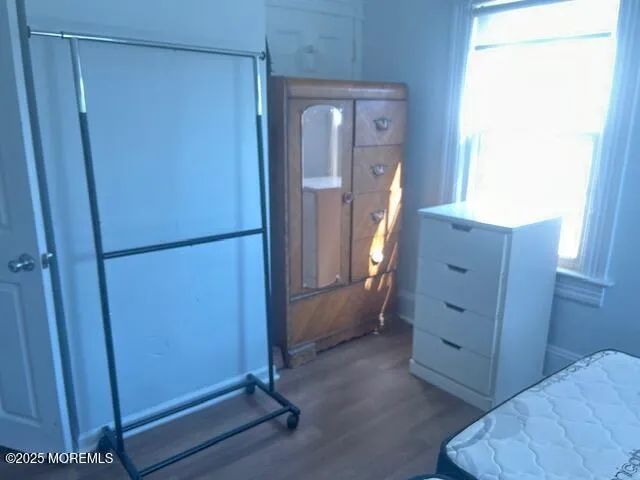 a view of a dresser in the bathroom