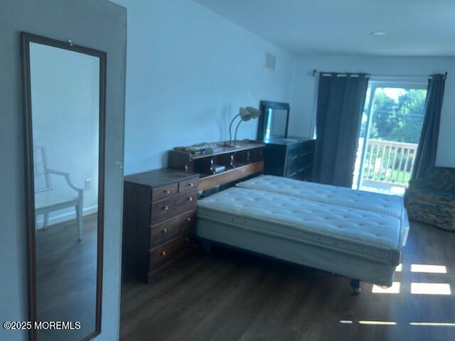 1047 Stratton Place Long Branch, NJ 07740 - Photo 10 of 22 a bed sitting in a bedroom next to a window