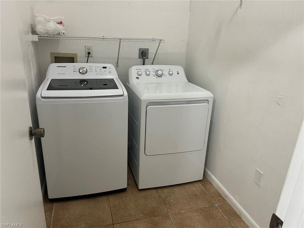 3841 Schoolhouse Road East, Unit 7 Fort Myers, FL 33916 - Photo 14 of 24 a utility room with dryer and washer