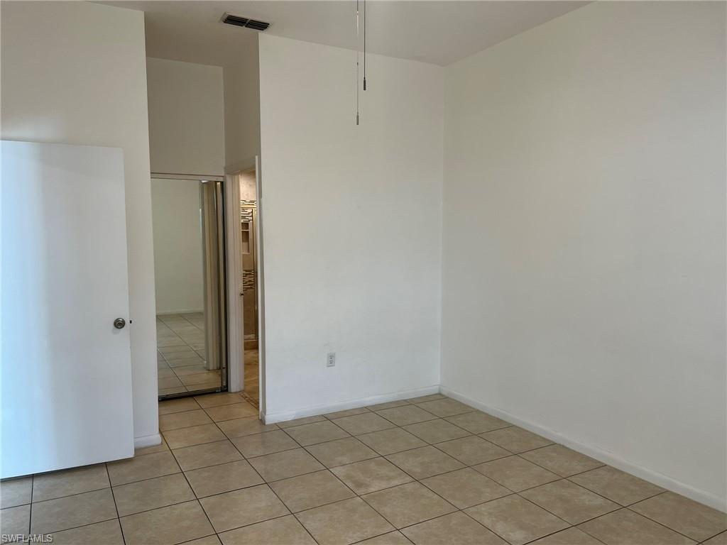 3841 Schoolhouse Road East, Unit 7 Fort Myers, FL 33916 - Photo 18 of 24 a view of an empty room