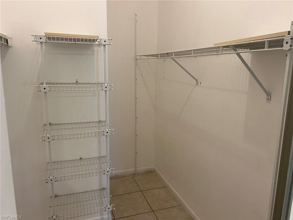 3841 Schoolhouse Road East, Unit 7 Fort Myers, FL 33916 - Photo 20 of 24 a view of walk in closet