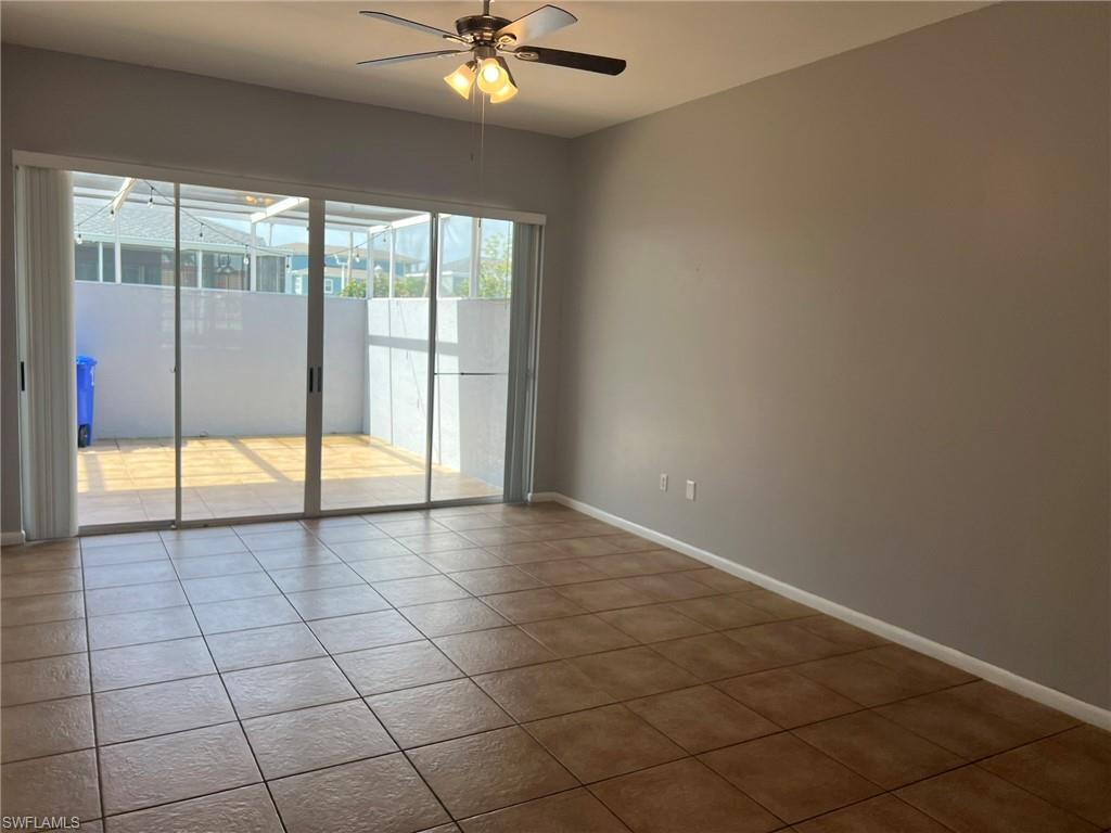 3841 Schoolhouse Road East, Unit 7 Fort Myers, FL 33916 - Photo 23 of 24 an empty room and window