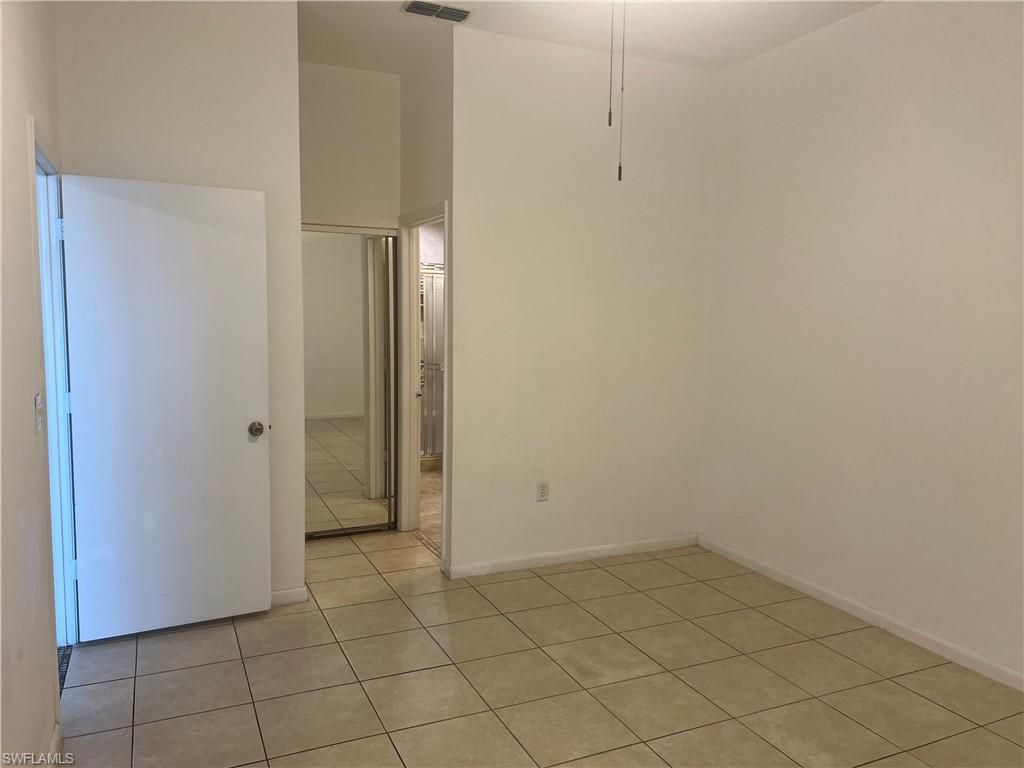 3841 Schoolhouse Road East, Unit 7 Fort Myers, FL 33916 - Photo 10 of 24 a view of an empty room