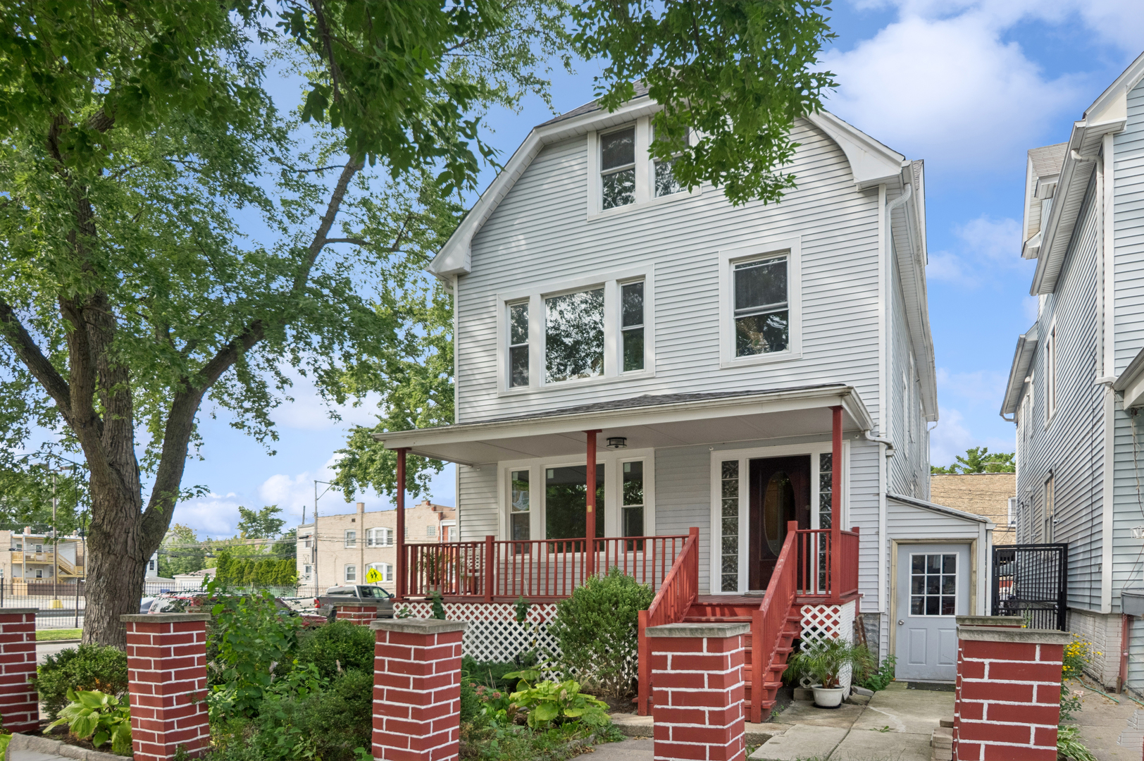 3300 North Karlov Avenue, Unit 1 Chicago, IL 60641 - Photo 1 of 17 front view of a house with a yard