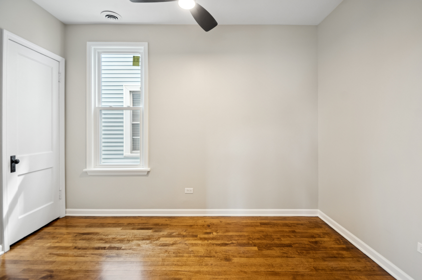 3300 North Karlov Avenue, Unit 1 Chicago, IL 60641 - Photo 12 of 17 an empty room with window