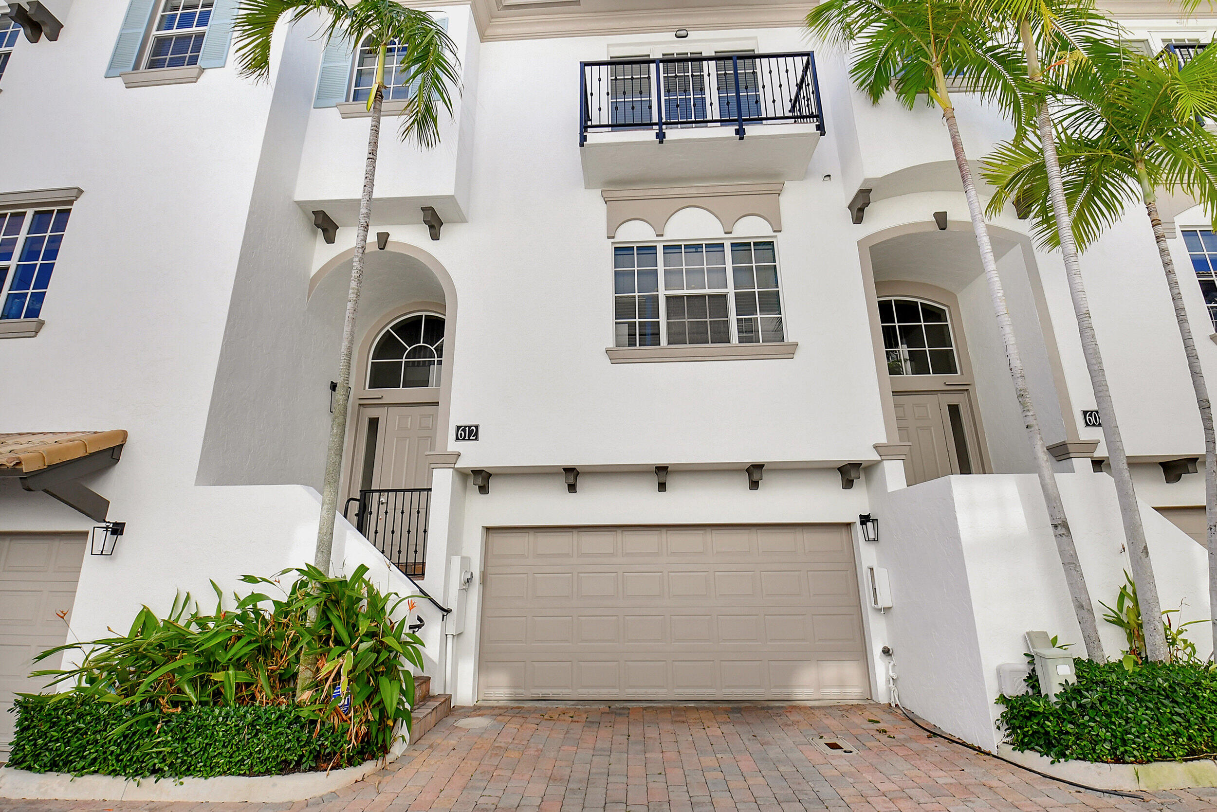 612 Renaissance Way Delray Beach, FL 33483 - Photo 25 of 38 612 Garage and Entryway