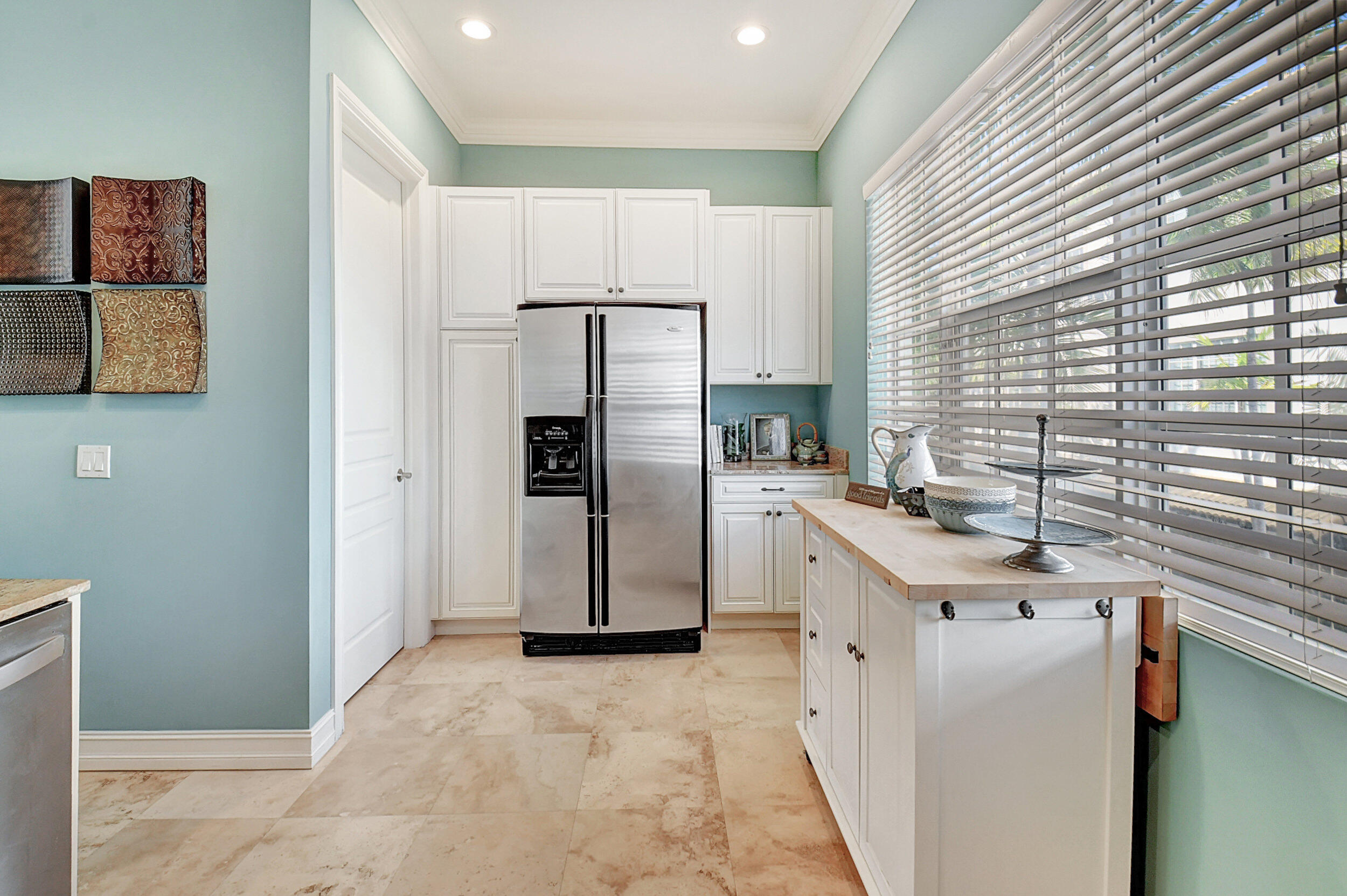 612 Renaissance Way Delray Beach, FL 33483 - Photo 8 of 38 612 Kitchen & Laundry Room