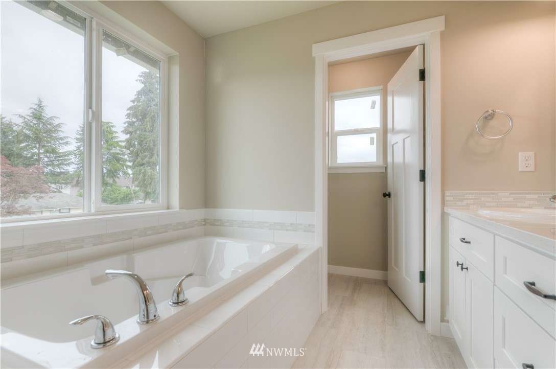 3294 Prill Road Centralia, WA 98531 - Photo 14 of 23 a white bath tub sitting next to a window